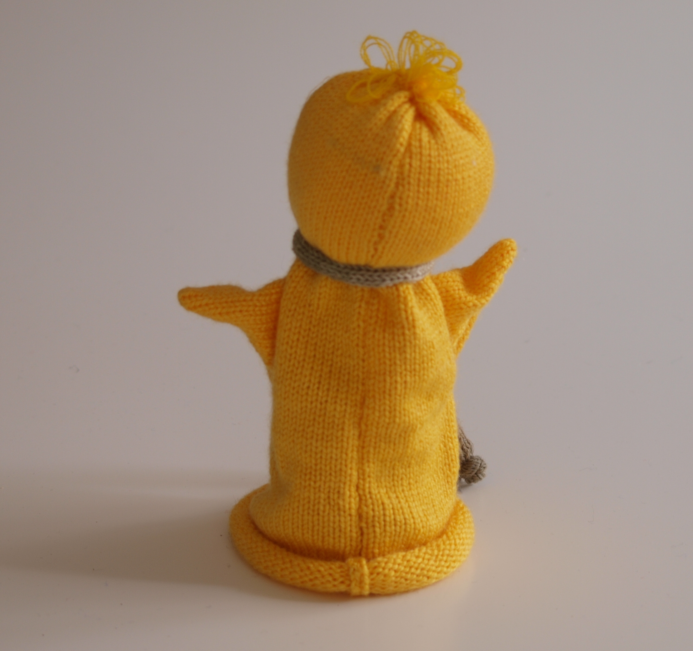 Handspielfigur Ente von hinten