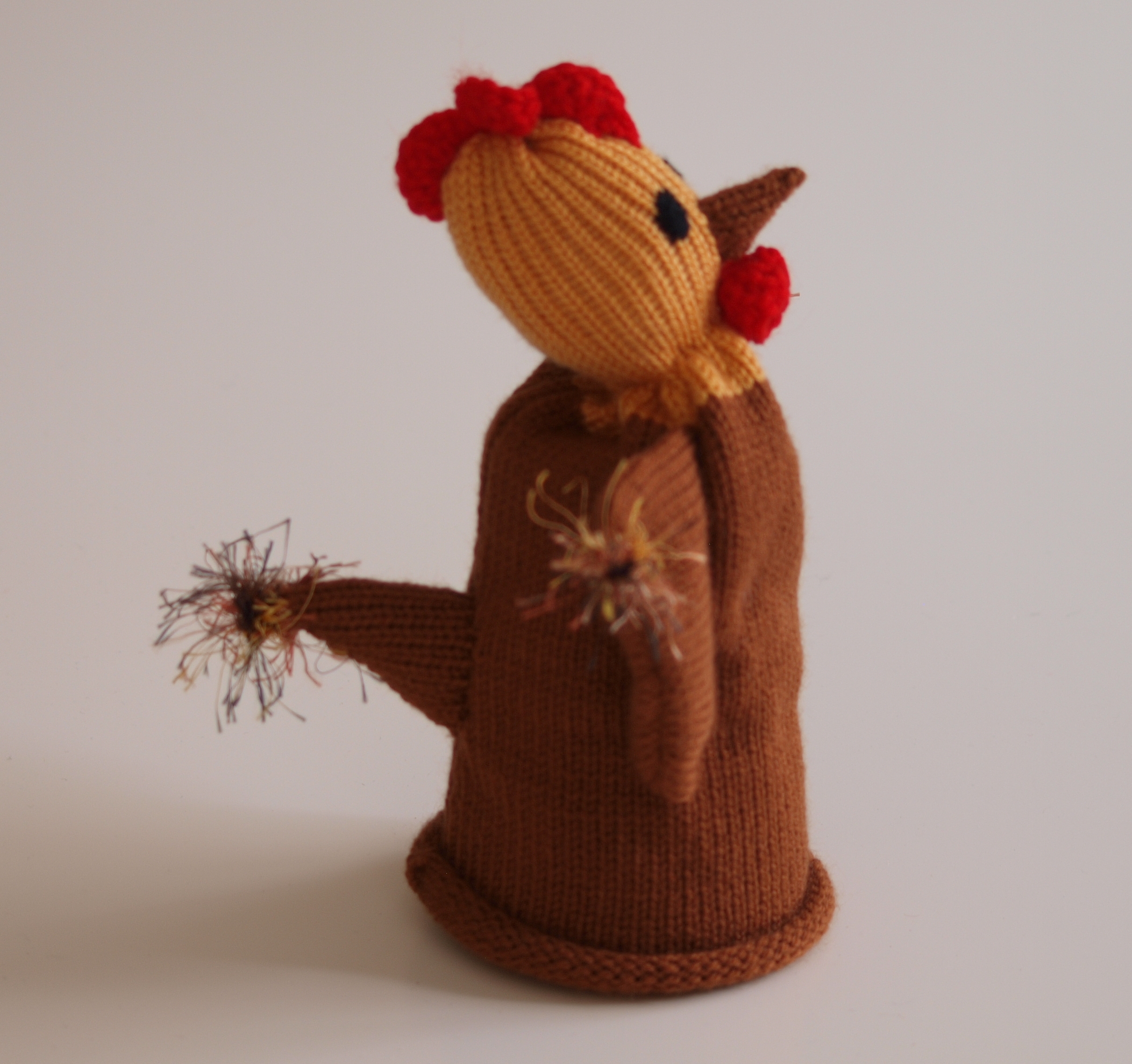 Handspielfigur Hahn von rechts