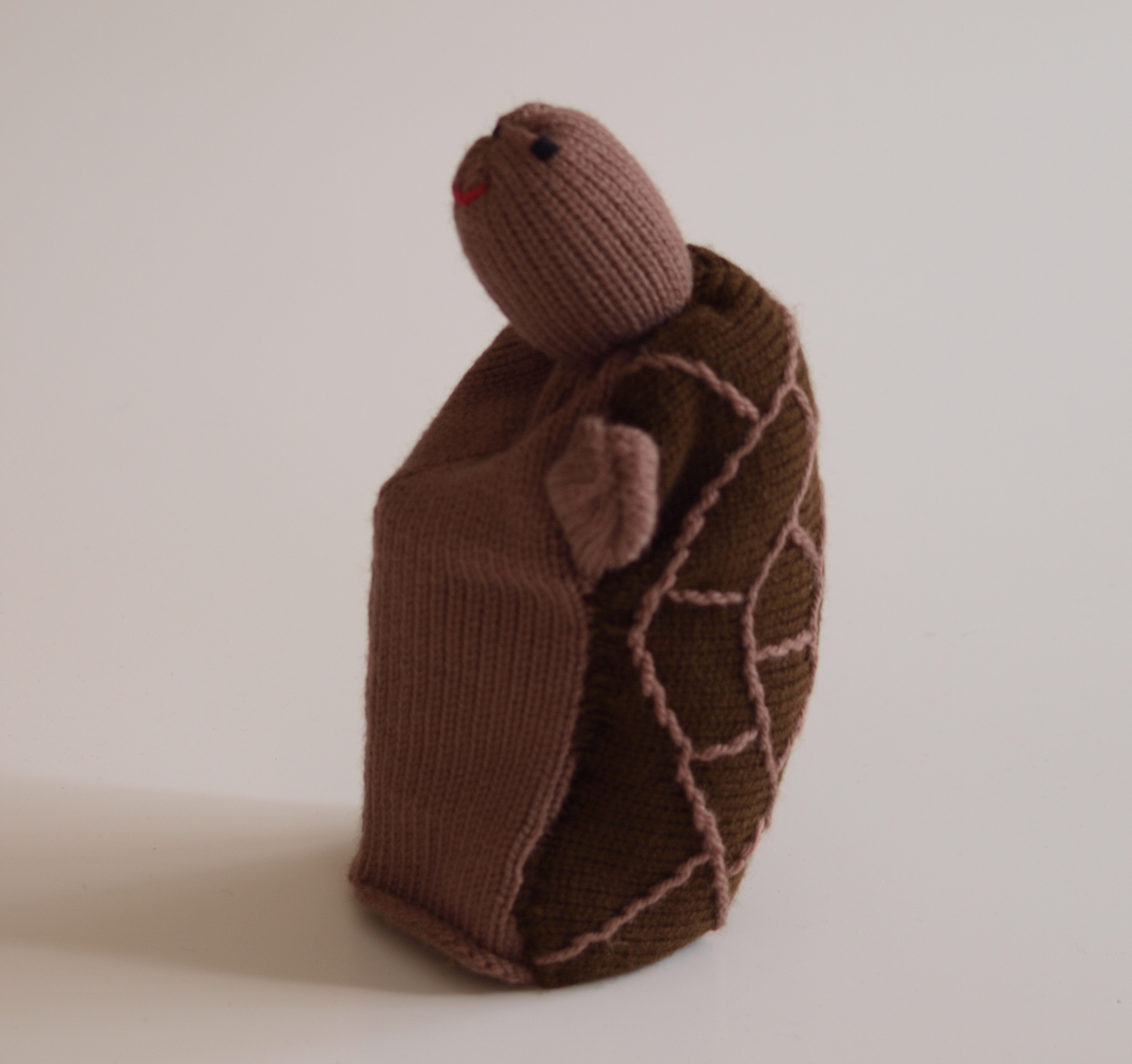 Handspielfigur Schildkröte von hinten